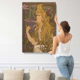 Job Art Nouveau Woman with Flowing Hair by Alphonse Mucha canvas print, displayed on a wall