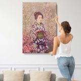 Geisha with Cherry Blossoms by Ogawa Kazumasa canvas print, displayed on a wall