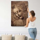 La Scapigliata by Leonardo da Vinci canvas print, displayed on a wall