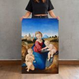 Madonna and Child with the Infant Saint John by Raphael canvas print, held for scale