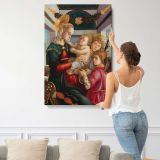 Madonna and Child with Angels by Sandro Botticelli canvas print, displayed on a wall
