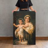 Virgin Mary Holding Baby Jesus canvas print, held for scale
