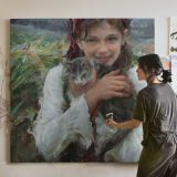 Girl Holding a Cat by Daniel Gerhartz — room mockup view 3