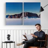 Greenland Coast by Rockwell Kent - two-panel canvas displayed in a reading room