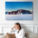 Greenland Coast by Rockwell Kent - single-panel canvas displayed above a sofa
