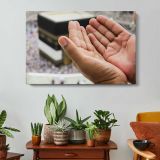 Hands Raised in Prayer at the Kaaba - single-panel canvas displayed above a console table
