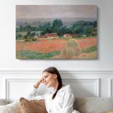 Haystack at Giverny by Claude Monet - single-panel canvas displayed above a sofa
