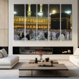 Illuminated Kaaba at Night - multi-panel canvas displayed in a modern living room