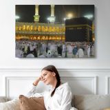 Illuminated Kaaba at Night - single-panel canvas displayed above a sofa