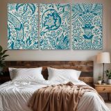 Indian Floral Pattern in Blue and Cream by William Morris — three-panel canvas above a bed