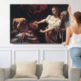 Judith Beheading Holofernes by Caravaggio - single-panel canvas shown with a person for scale