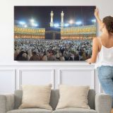 Kaaba and the Grand Mosque at Night - single-panel canvas shown with a person for scale