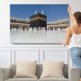 Kaaba beneath a Clear Blue Sky - single-panel canvas shown with a person for scale