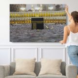 Kaaba in the Grand Mosque Courtyard - single-panel canvas shown with a person for scale
