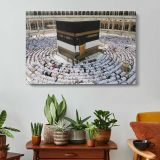 Kaaba Surrounded by Pilgrims - single-panel canvas displayed above a console table