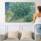 Lilac Bush by Vincent Van Gogh - single-panel canvas shown with a person for scale