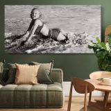 Marilyn Monroe on the Beach - 1952 — single-panel canvas above a green sofa