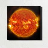NASA's Solar Dynamics Observatory captured images of the sun emitting a mid-level solar flare — room mockup view 1