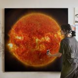 NASA's Solar Dynamics Observatory captured images of the sun emitting a mid-level solar flare — room mockup view 3