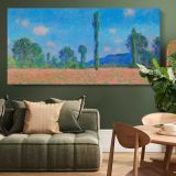 Poppy Field at Giverny by Claude Monet — single-panel canvas above a green sofa