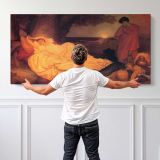 Reclining Woman in a Golden Interior by Frederic Leighton — single-panel canvas shown behind a standing person for scale