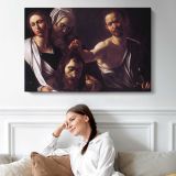 Salome with the Head of Saint John the Baptist by Caravaggio - single-panel canvas displayed above a sofa