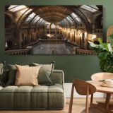 Sunlit Hall at the Natural History Museum — single-panel canvas above a green sofa