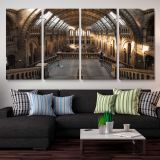 Sunlit Hall at the Natural History Museum — three-panel canvas arrangement above a sofa