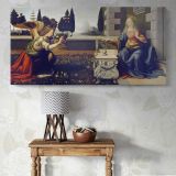 The Annunciation by Leonardo da Vinci — single-panel canvas above a console table