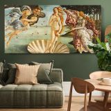 The Birth of Venus by Sandro Botticelli — single-panel canvas above a green sofa