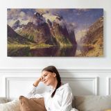 The Fjord by Adelsteen Normann — single-panel canvas shown above a seated person
