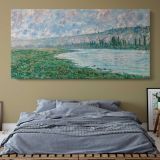 The Seine at Vetheuil by Claude Monet — single-panel canvas above a bed with blue bedding