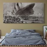 The Sinking of the Titanic by Willy Stower — single-panel canvas above a bed with blue bedding