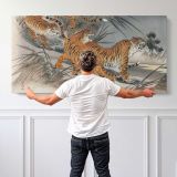 Tigers and Soldiers by Fukuda Hatsujiro — single-panel canvas shown behind a standing person for scale