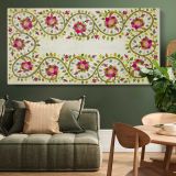Turkish Pillow Floral Embroidery Pattern by William Morris — single-panel canvas above a green sofa