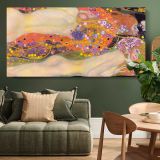 Water Serpents II by Gustav Klimt — single-panel canvas above a green sofa