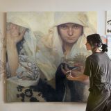 Woman Holding a Small Bird and Flowers — room mockup view 3
