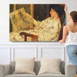 Woman Reclining on a Sofa - single-panel canvas shown with a person for scale