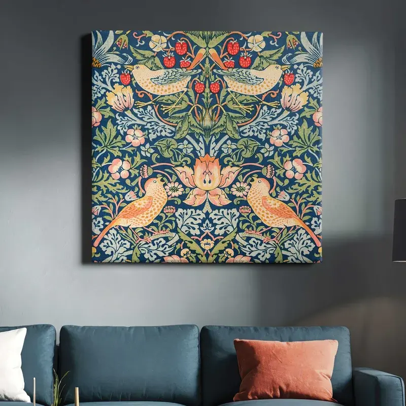 Strawberry Thief canvas displayed above a blue sofa